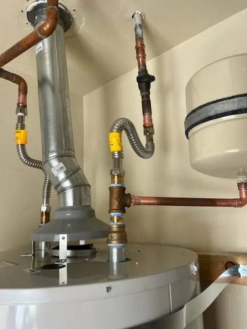 Water heater installation and plumbing repair in Lents